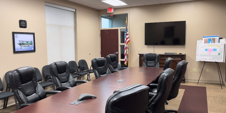FBO Conference Room, filled with leather chairs